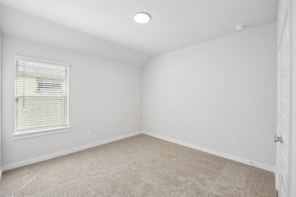 1448 Companero Street Haslet, TX 76052 - Photo 26 of 35 an empty room with a window