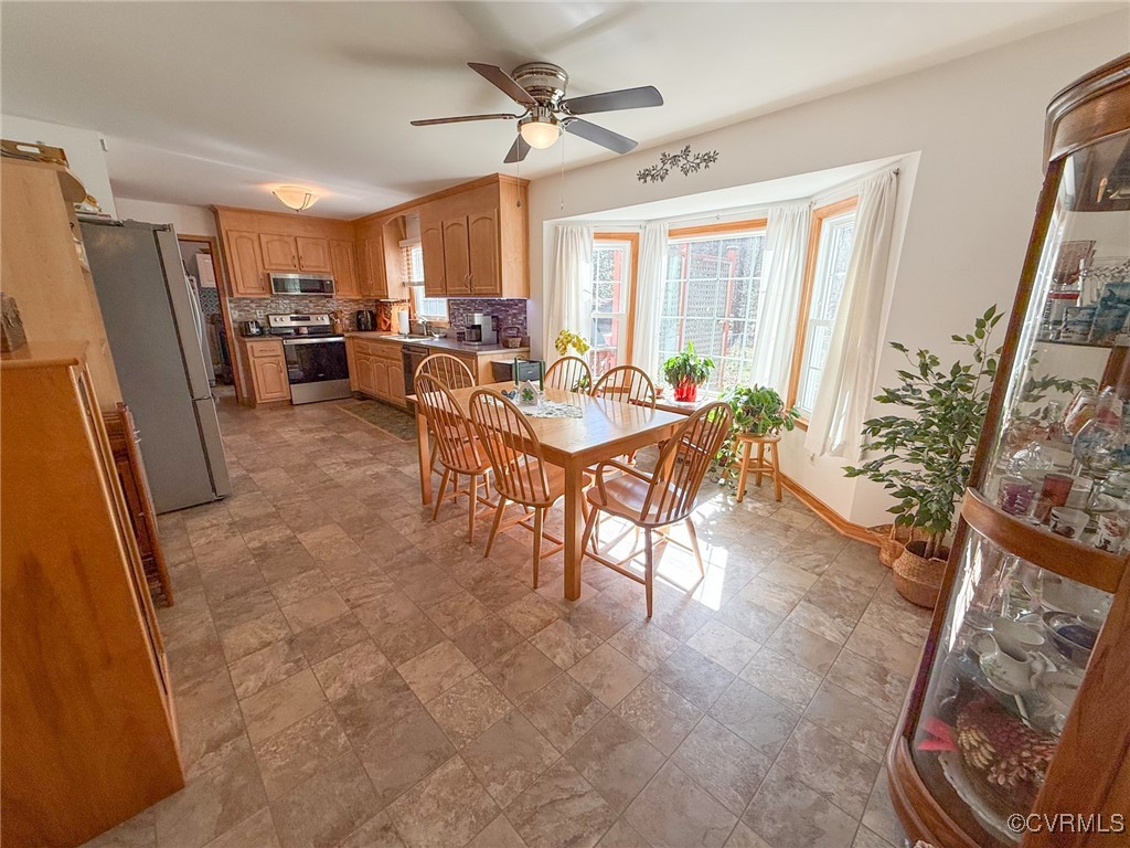 2828 Sutherland Road Sutherland, VA 23885 - Photo 8 of 41 Dining space featuring ceiling fan and baseboards