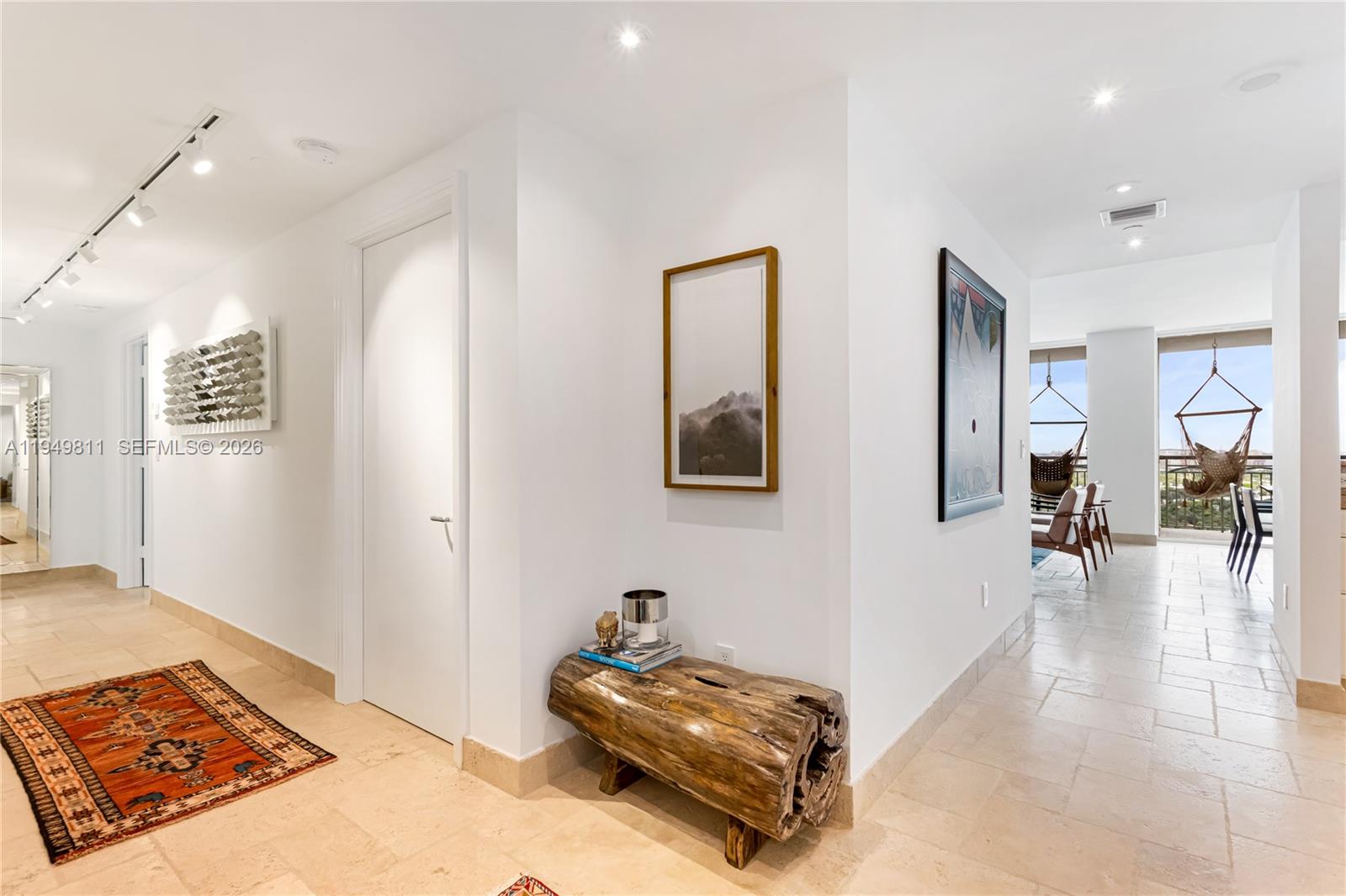 a living room with furniture and a table