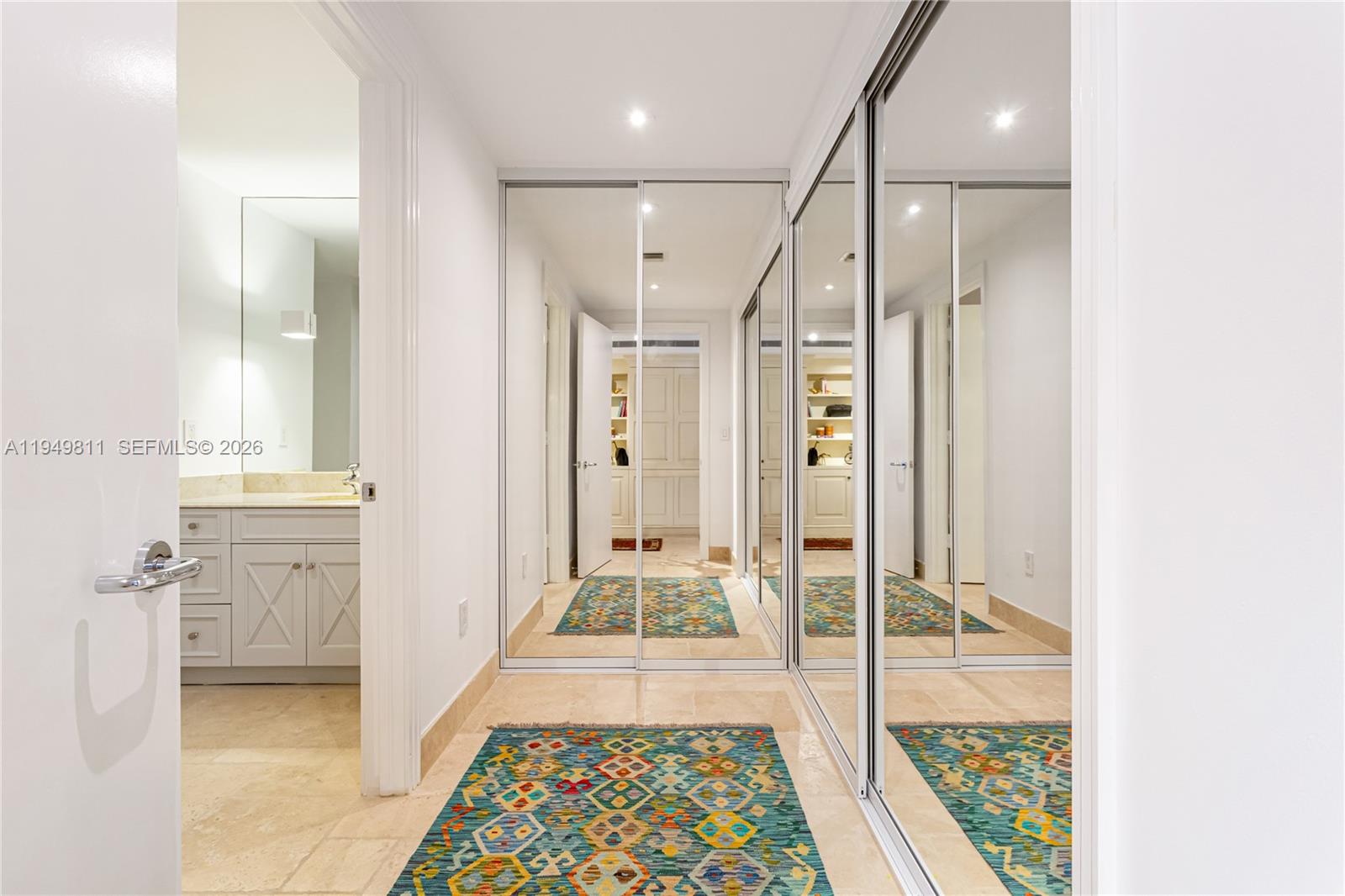 3400 Southwest 27th Avenue, Unit 2104 Miami, FL 33133 - Photo 21 of 26 a bathroom with a glass shower door