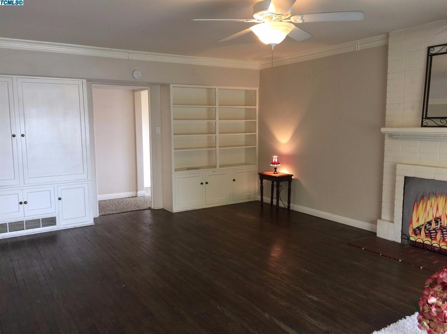 332 Channing Way Exeter, CA 93221 - Photo 8 of 29 Built-in bookcases are some of the Vinta