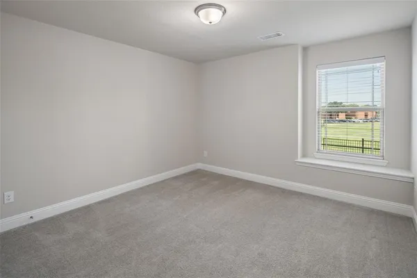 an empty room with a window