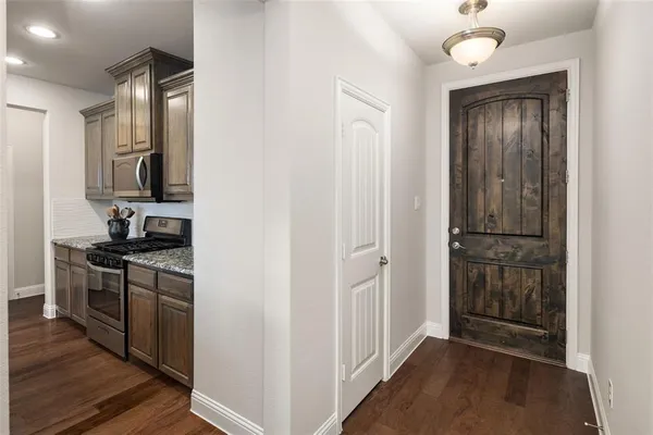 a kitchen with a refrigerator stove and a sink