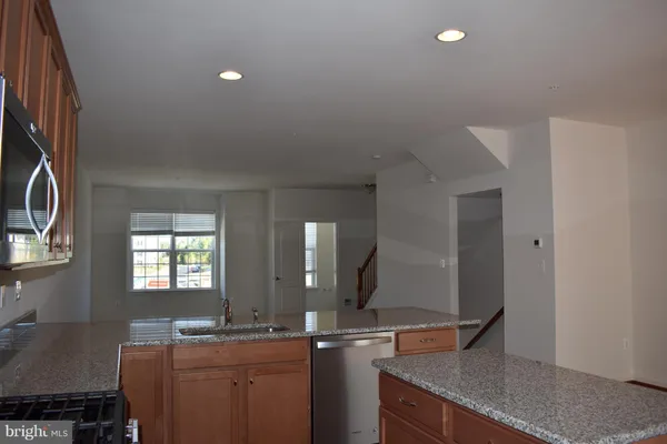 a bathroom with 2 sink and a mirror