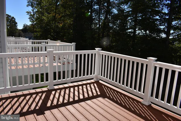 a bathroom with a sink and a window