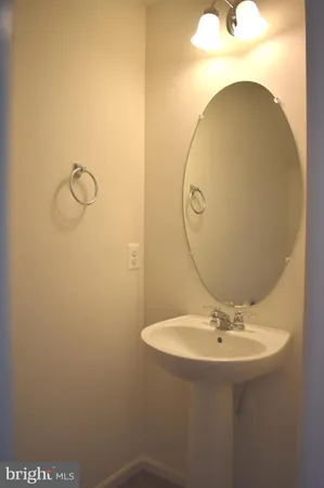 a view of a house with a yard and a large window