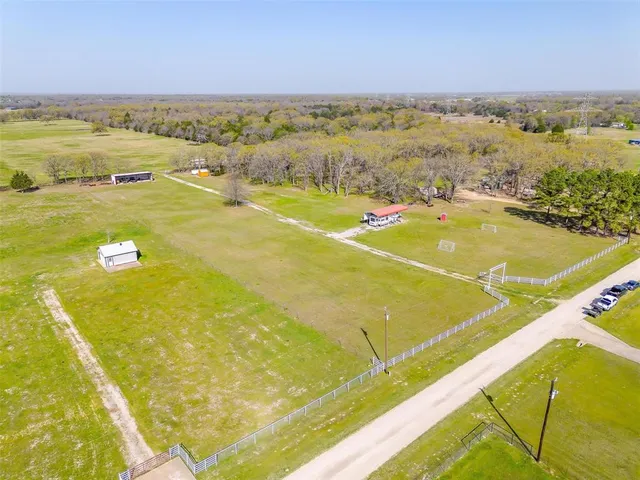 a view of a golf course with a lake