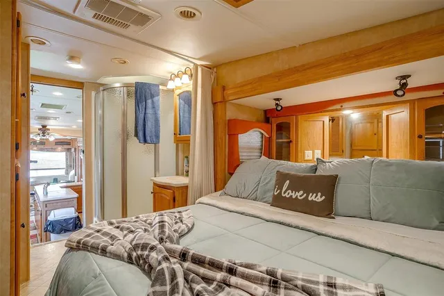 a kitchen with stainless steel appliances granite countertop a stove and a refrigerator