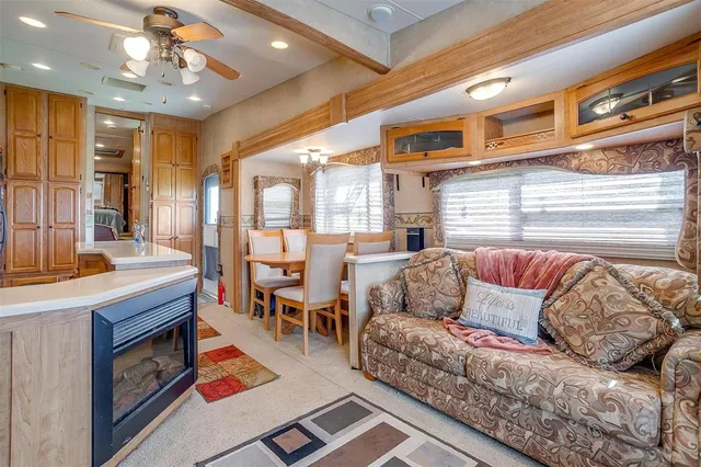 a kitchen with stainless steel appliances granite countertop a stove and a refrigerator