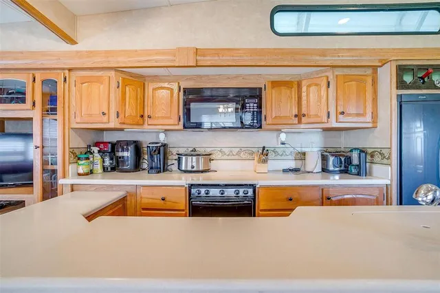 a very nice looking dining room with a large window