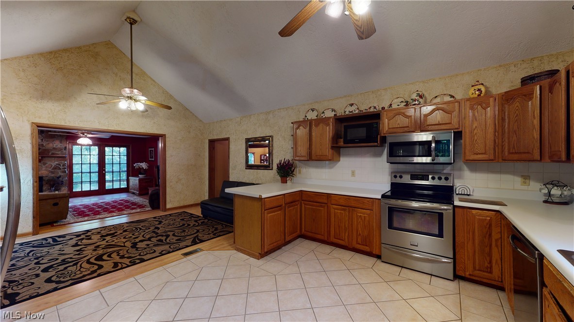 685 Horseneck Road Waverly, WV 26184 - Photo 13 of 32 VAULTED CEILING IN KITCHEN AND DINING