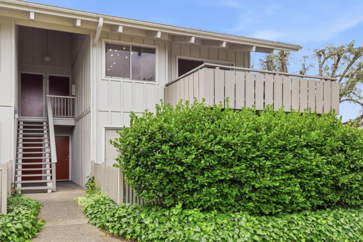 255 South Rengstorff Avenue, Unit 2 Mountain View, CA 94040 - Photo 20 of 25 a view of a house with a flower garden