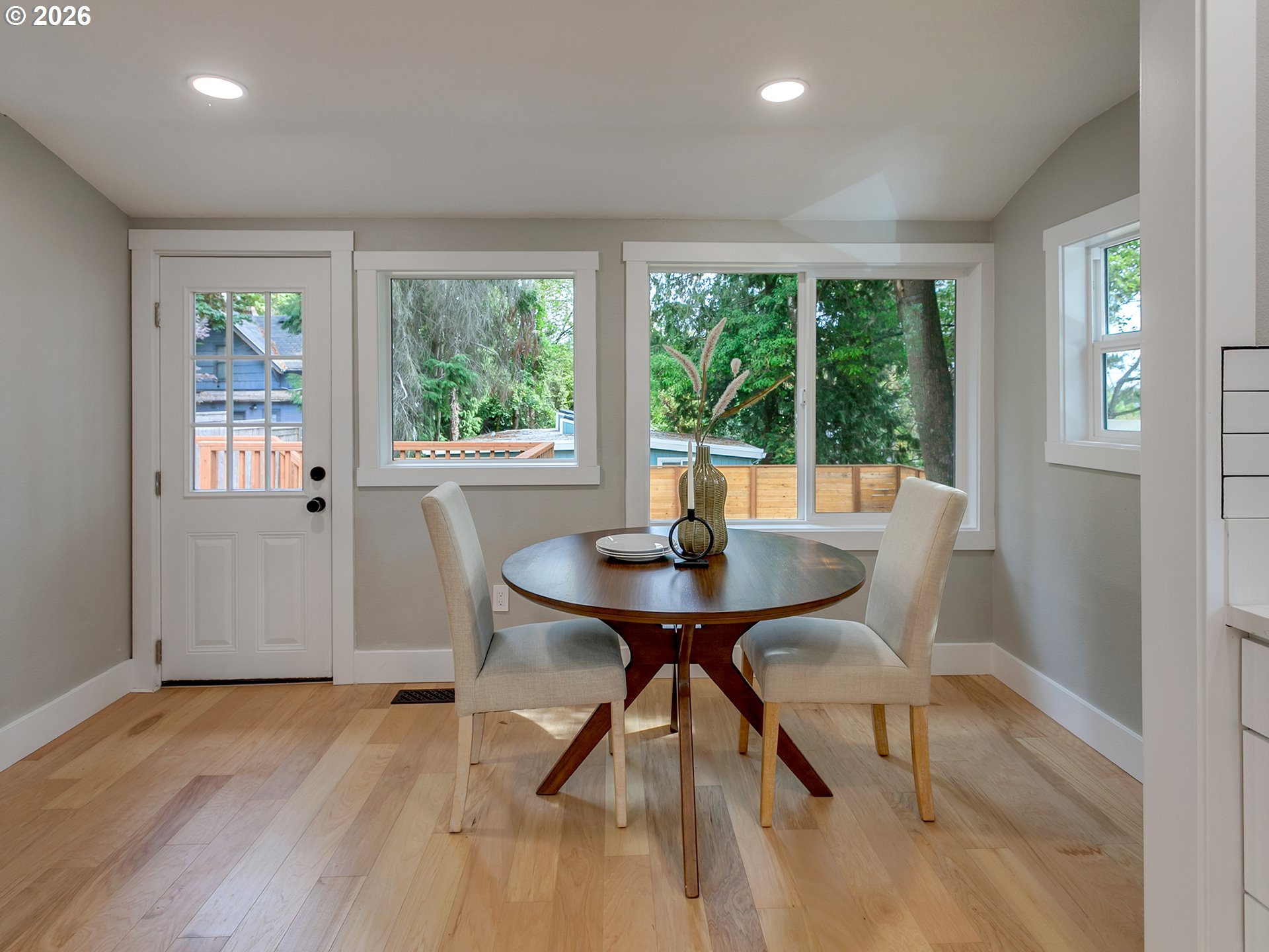 7224 Southwest 3rd Avenue Portland, OR 97219 - Photo 20 of 42 a view of a dining room with furniture and window