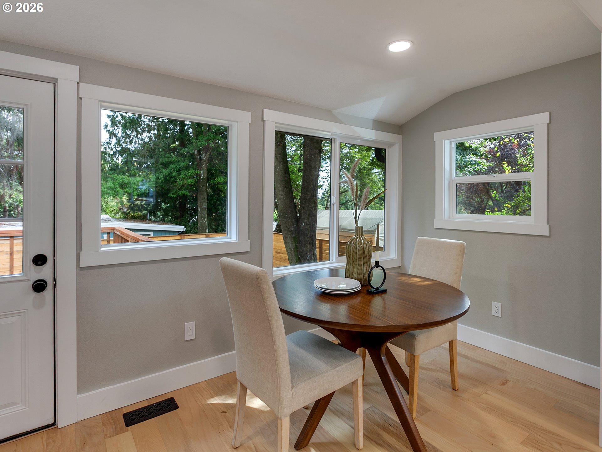 7224 Southwest 3rd Avenue Portland, OR 97219 - Photo 21 of 42 a view of a dining room with furniture window and outside view