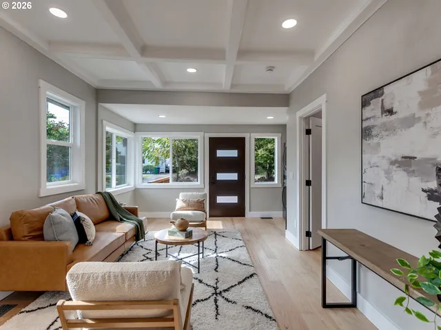 a living room with furniture and window