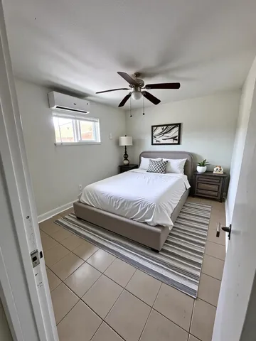 a bathroom with a sink a toilet and a bathtub