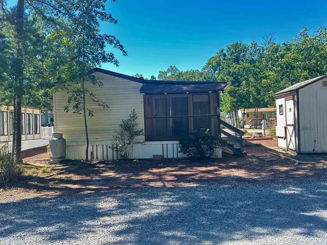 a view of a back yard of the house