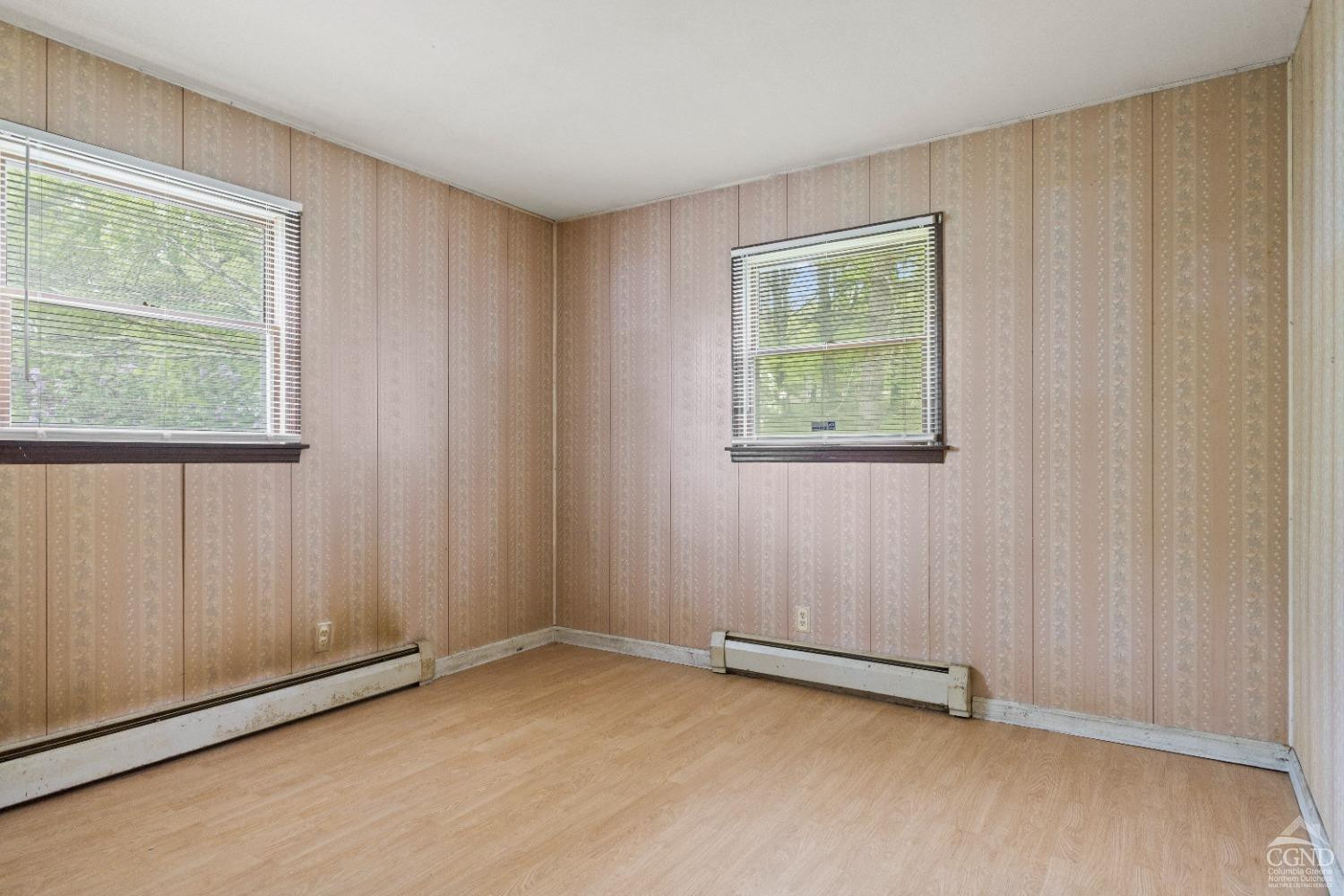 843 Indian Ridge Road Cairo, NY 12058 - Photo 12 of 33 an empty room with windows