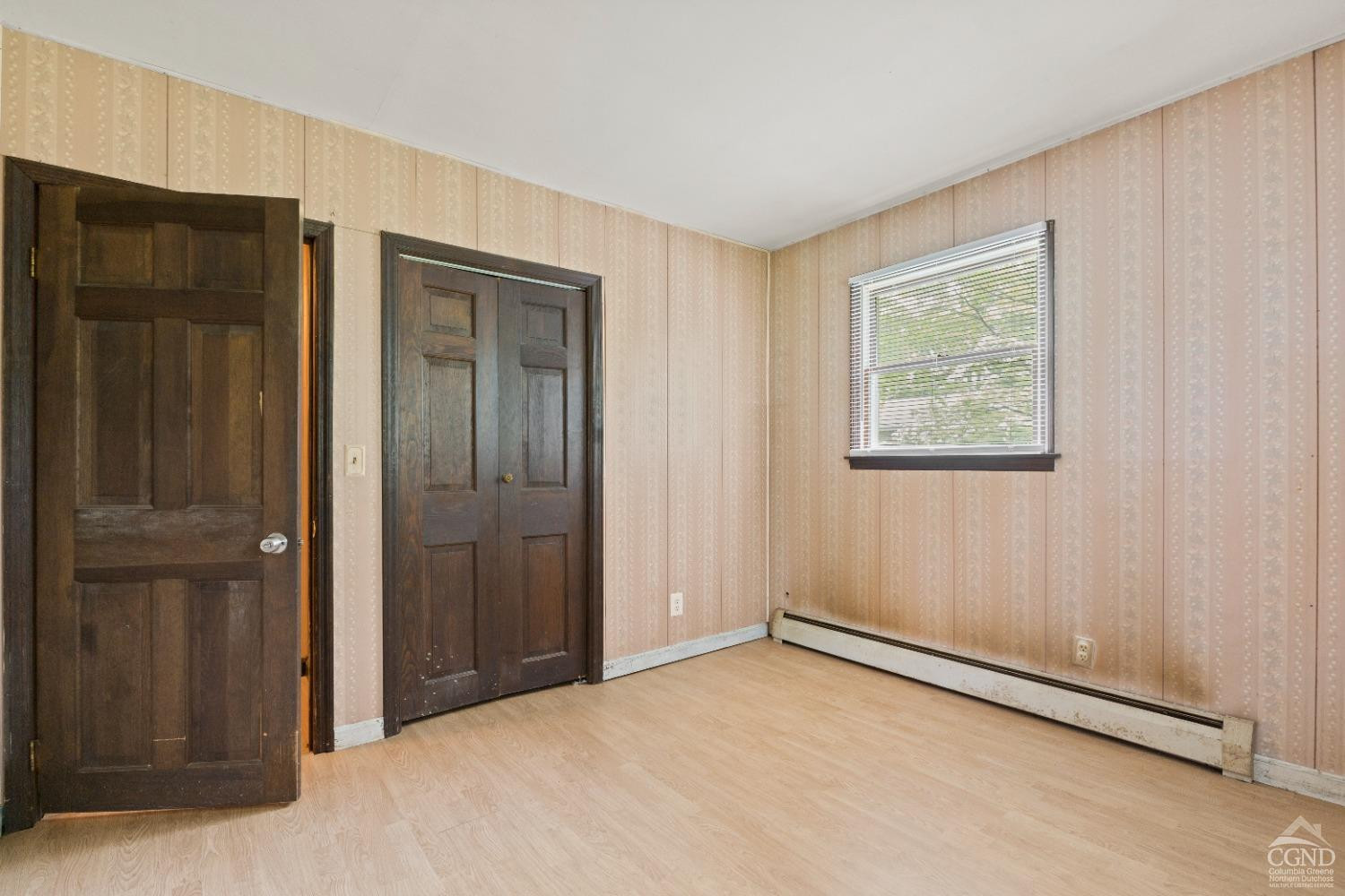 843 Indian Ridge Road Cairo, NY 12058 - Photo 13 of 33 an empty room with windows and closet