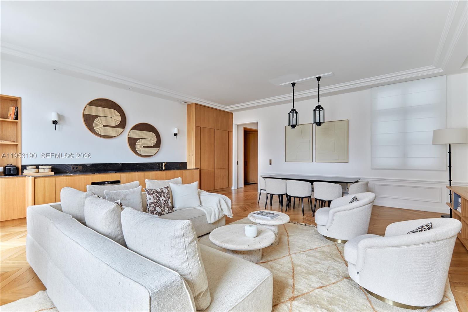 11 Rue Saint-Dominique, Unit SDO 403 Carrollton, IDF 75007 - Photo 22 of 40 a living room with furniture and a window