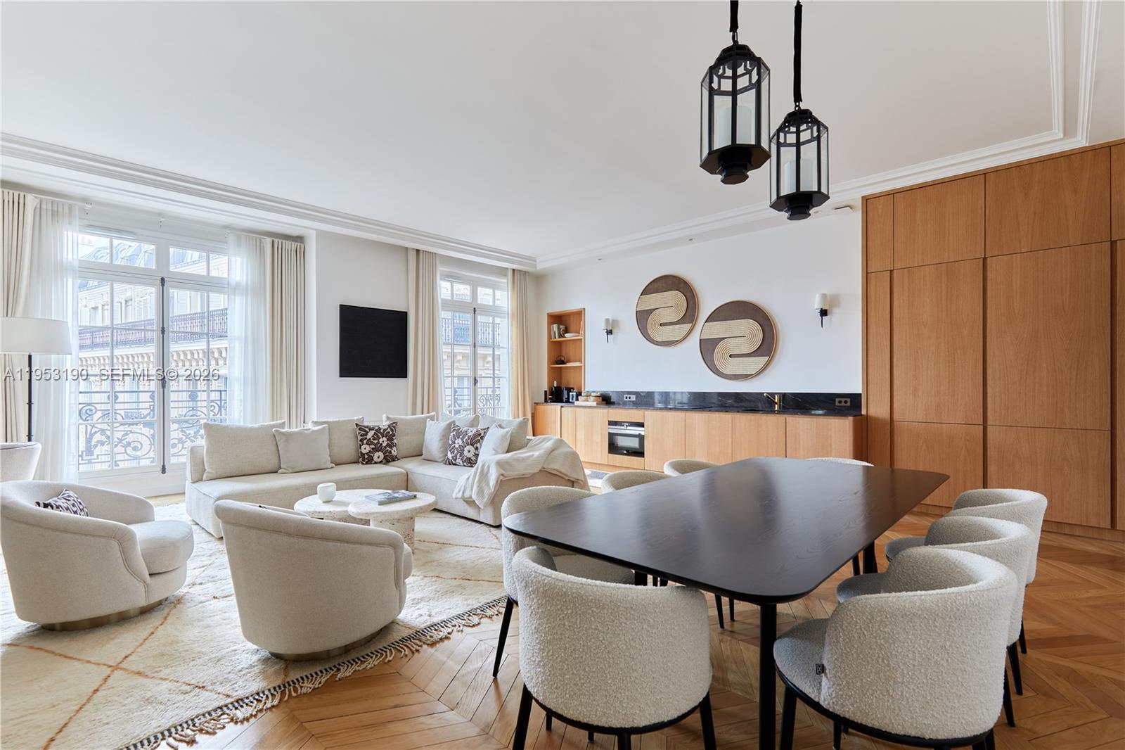 11 Rue Saint-Dominique, Unit SDO 403 Carrollton, IDF 75007 - Photo 24 of 40 a living room with furniture a rug and a window