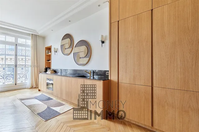 a spacious bathroom with a tub and a window