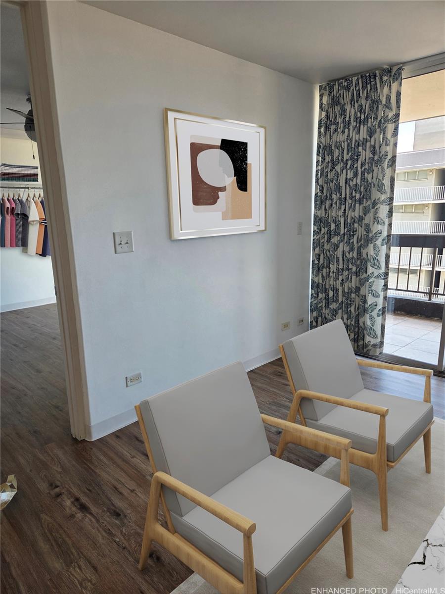 775 Kinalau Place, Unit 1508 Honolulu, HI 96813 - Photo 5 of 23 a laptop sitting on top of a wooden table