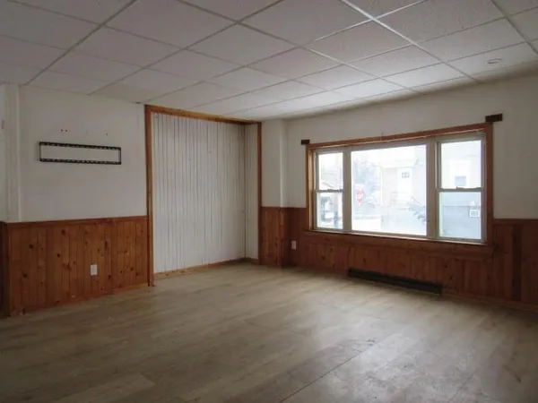 an empty room with windows