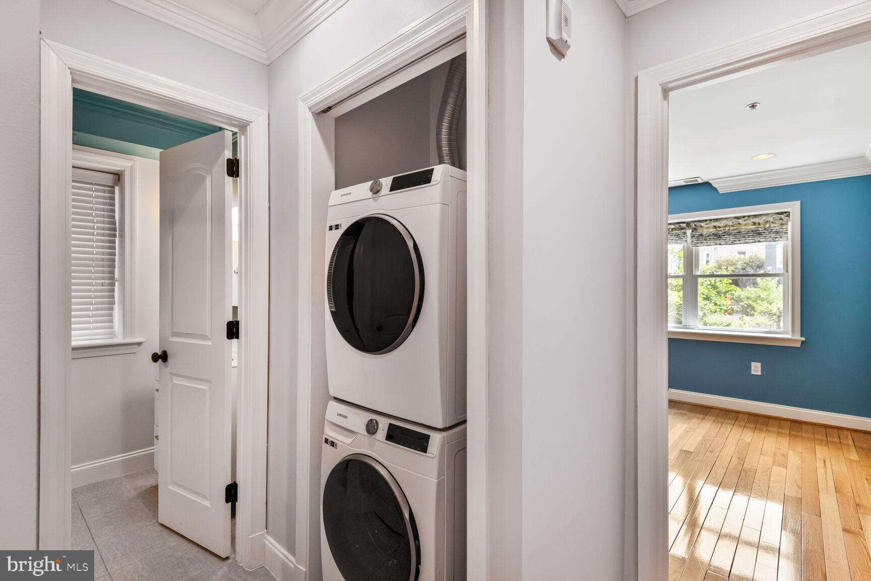 5511 Colorado Avenue Northwest, Unit 201 Washington, DC 20011 - Photo 14 of 15 a view of a hallway with washer and dryer