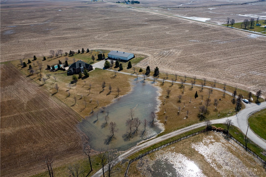 1 Hornbeam Road, Unit 1 Sabina, OH 45169 - Photo 7 of 7 This aerial view showcases a residence amidst expansive fields, featuring a private pool and outbuilding.