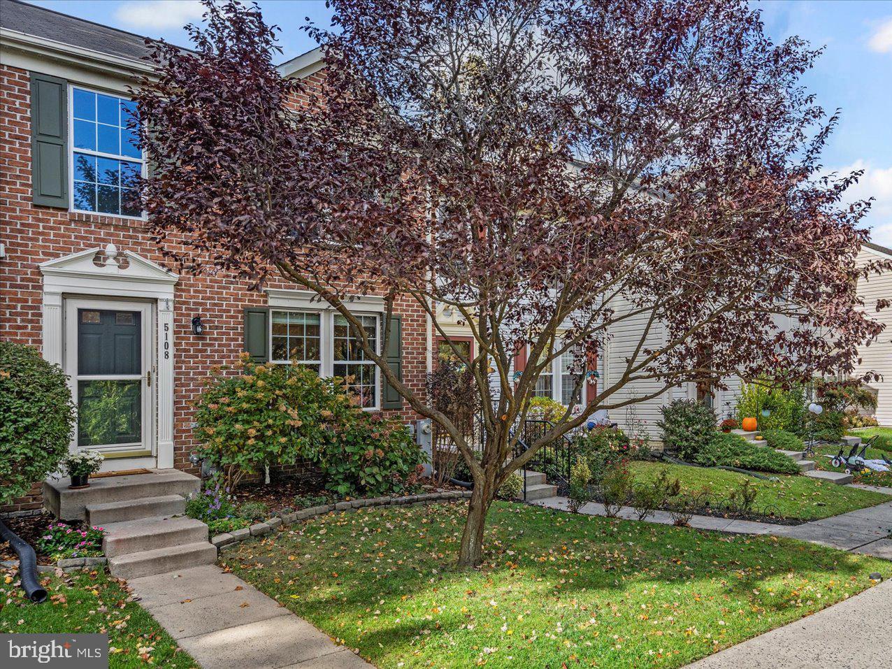 5108 Windermere Circle Baltimore, MD 21237 - Photo 2 of 38 a front view of a house with garden