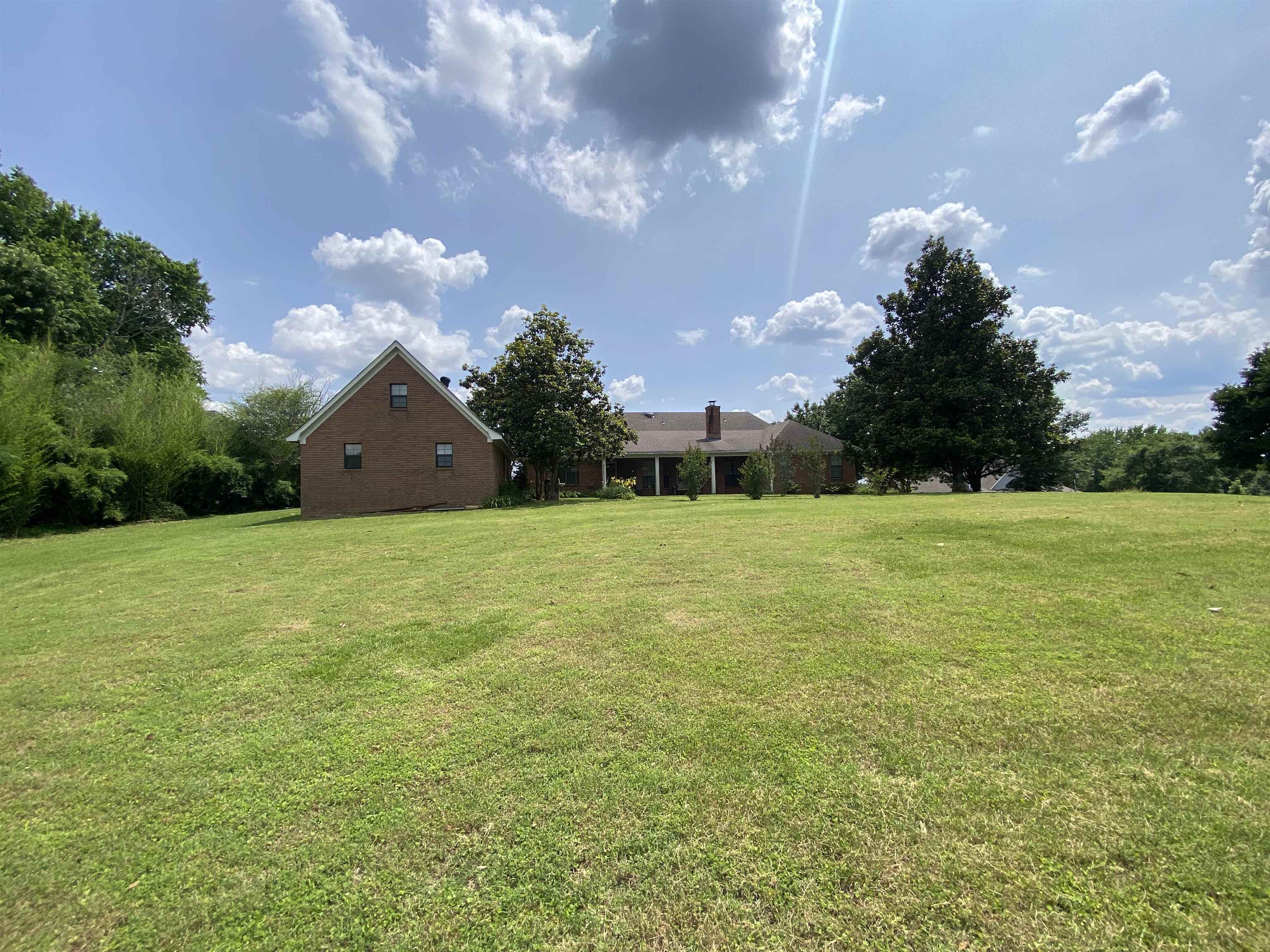 240 Sawmill Road Brighton, TN 38011 - Photo 11 of 25 View of green lawn