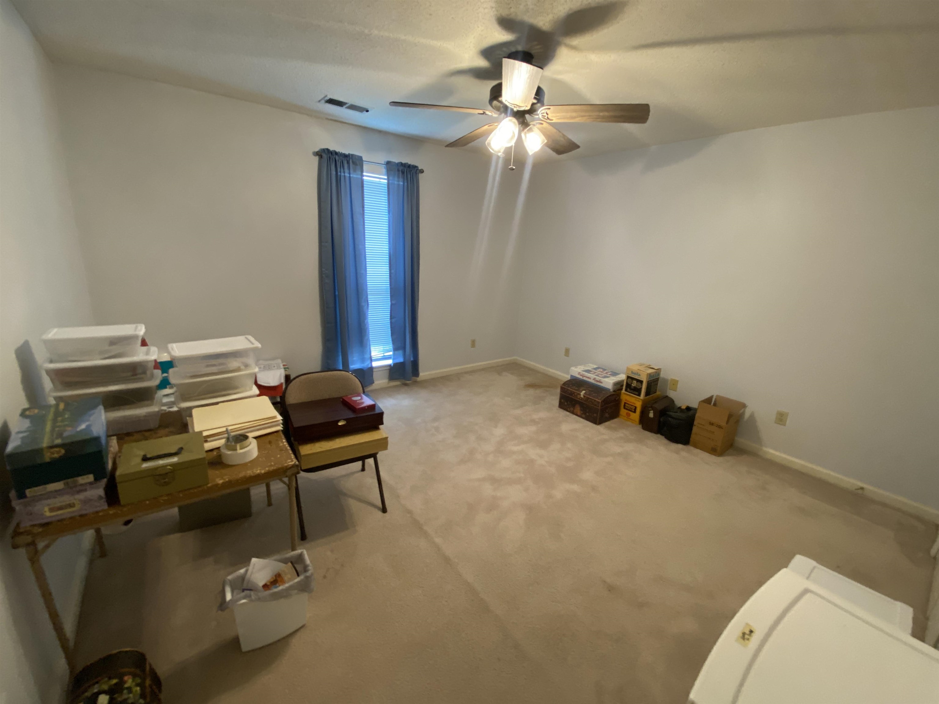 240 Sawmill Road Brighton, TN 38011 - Photo 18 of 25 Unfurnished room featuring ceiling fan, carpet floors, and baseboards