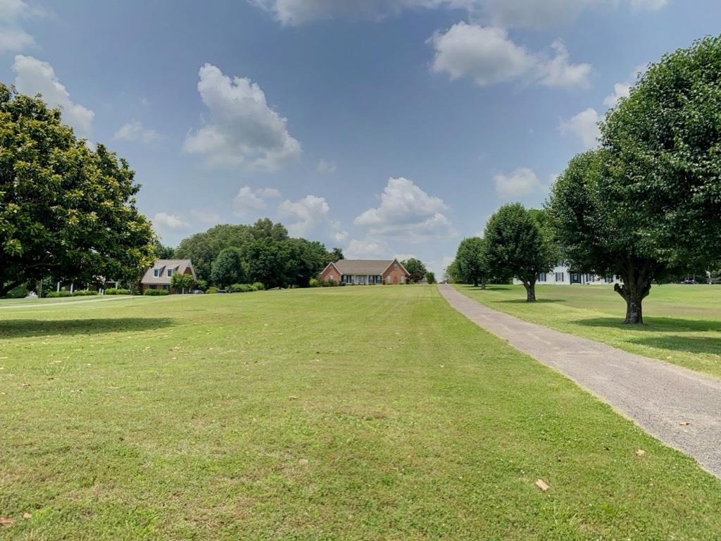 240 Sawmill Road Brighton, TN 38011 - Photo 25 of 25 View of community featuring a lawn