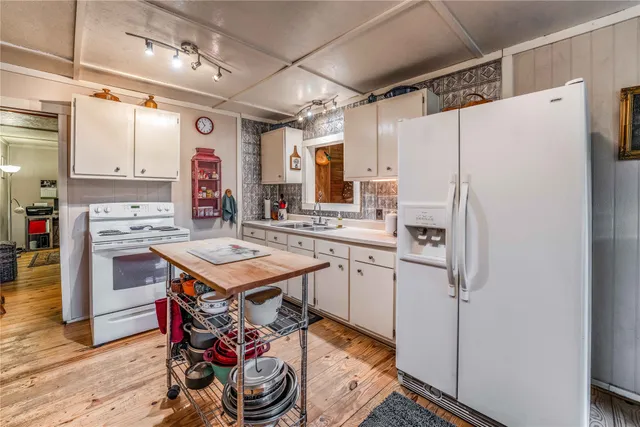 a storage room with washer and dryer