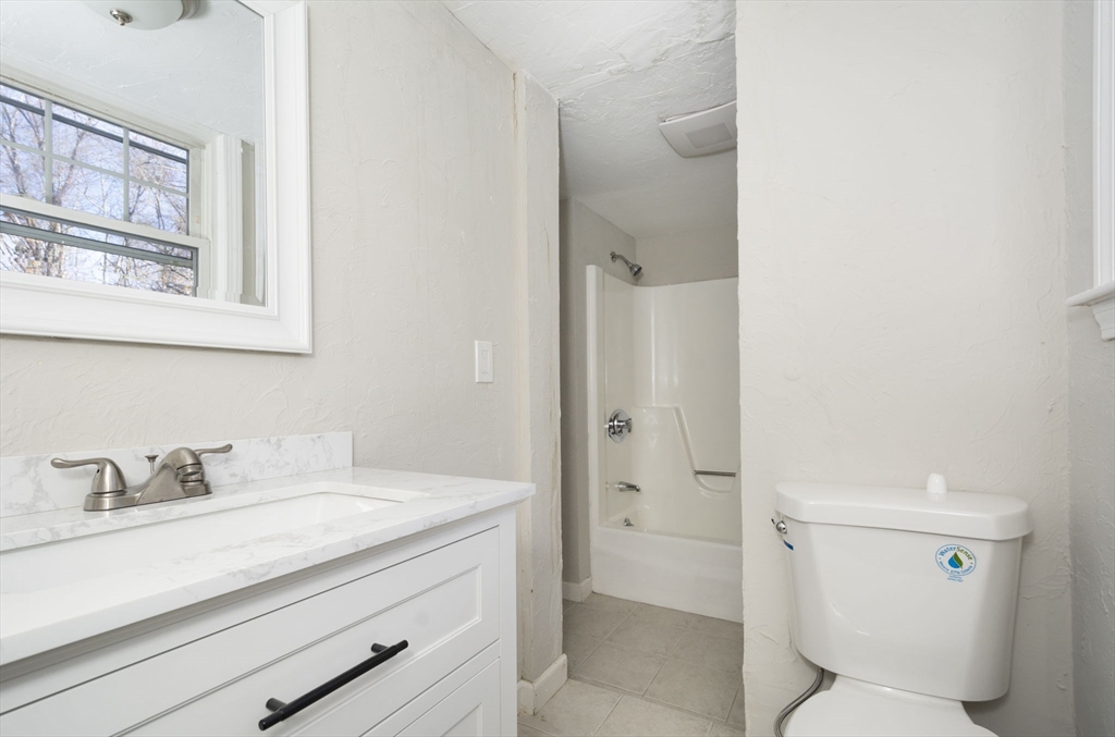 55 Dodge Road Sutton, MA 01590 - Photo 29 of 35 a bathroom with a sink toilet and shower