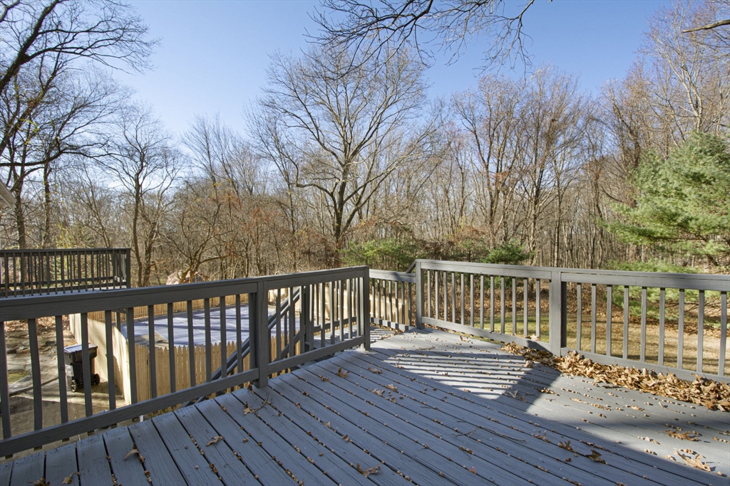 55 Dodge Road Sutton, MA 01590 - Photo 33 of 35 a view of balcony with wooden floor and fence