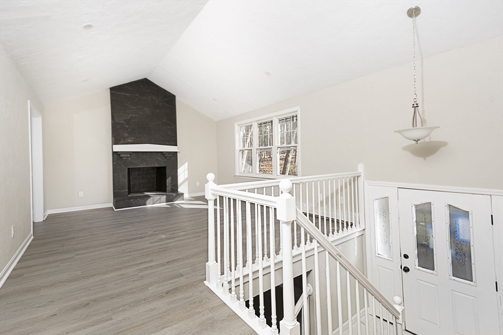 55 Dodge Road Sutton, MA 01590 - Photo 5 of 35 a view of livingroom with furniture and fireplace