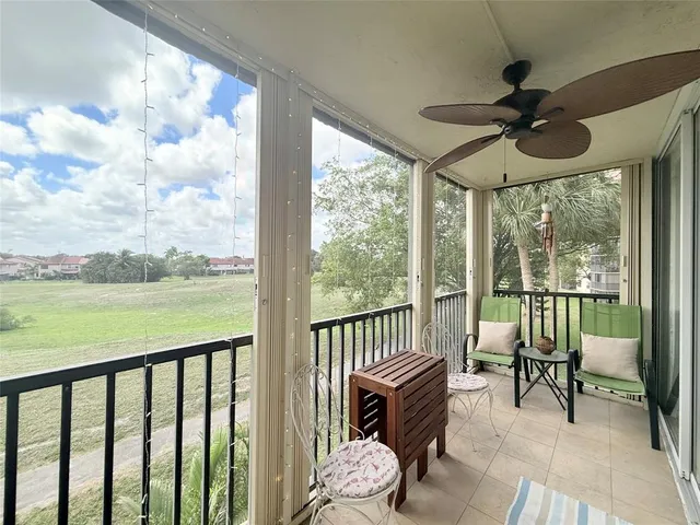 a view of a porch with furniture