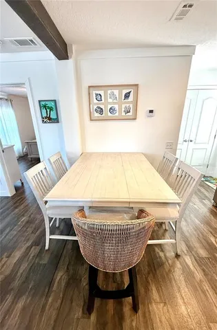 a kitchen with stainless steel appliances a refrigerator sink and microwave