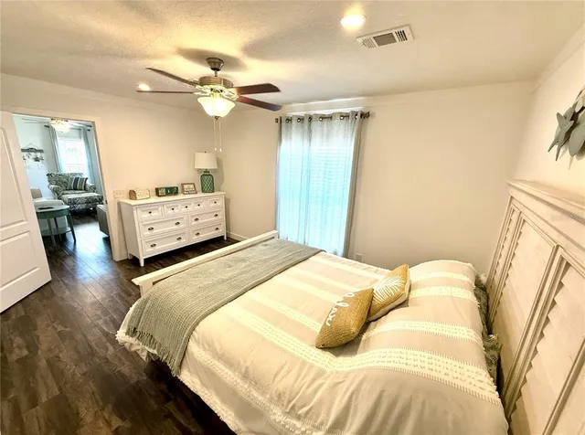 a spacious bathroom with double vanity sink and a mirror