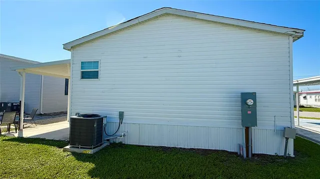 a view of house with backyard porch and entertaining space