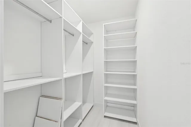 a view of an empty room and window