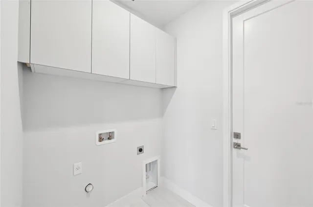 an aerial view of a house with a yard and garage