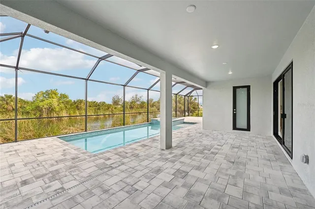 an aerial view of a house with a garden