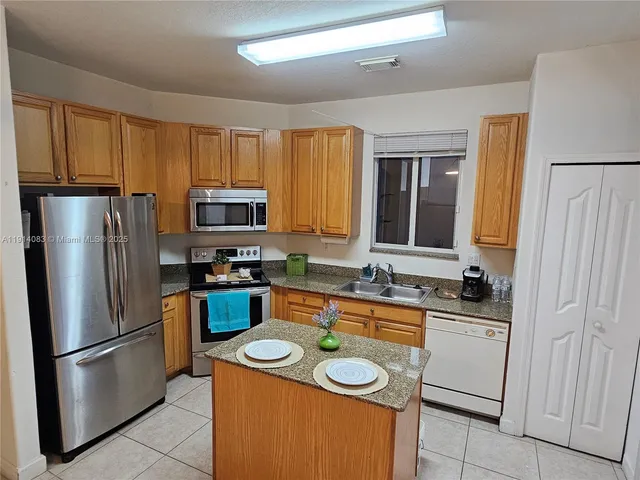 a view of a house with a garage