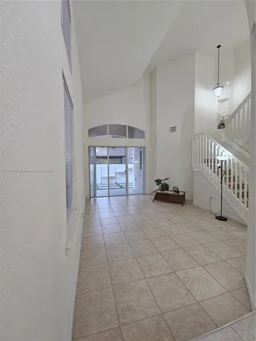 a view of a livingroom with a staircase