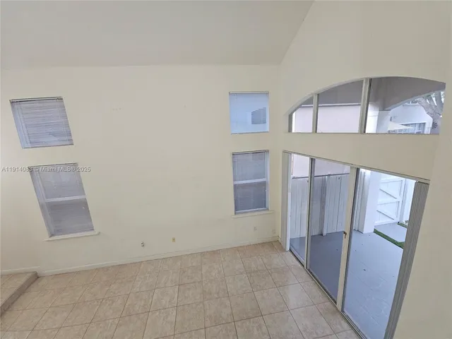 a view of an entryway with a hallway