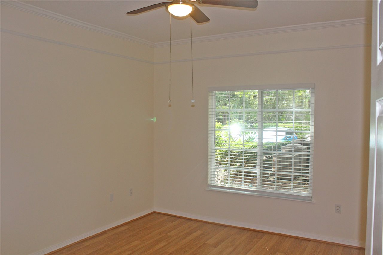 520 Florida Club Boulevard, Unit 103 St. Augustine, FL 32084 - Photo 18 of 26 a view of an empty room with a window