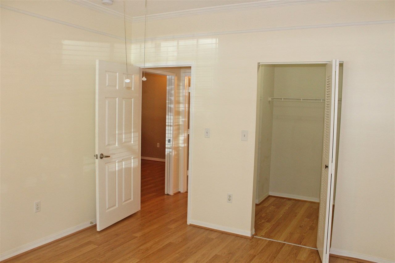 520 Florida Club Boulevard, Unit 103 St. Augustine, FL 32084 - Photo 19 of 26 a view of a bathroom with wooden floor